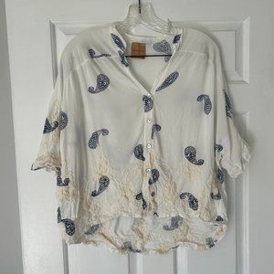 White blouse with blue pattern
